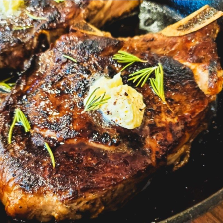 Grass-fed bone-in ribeye steak from Champion Valley Farm